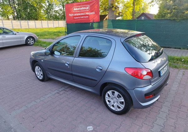 Peugeot 206 plus cena 11900 przebieg: 99875, rok produkcji 2009 z Szczecin małe 352